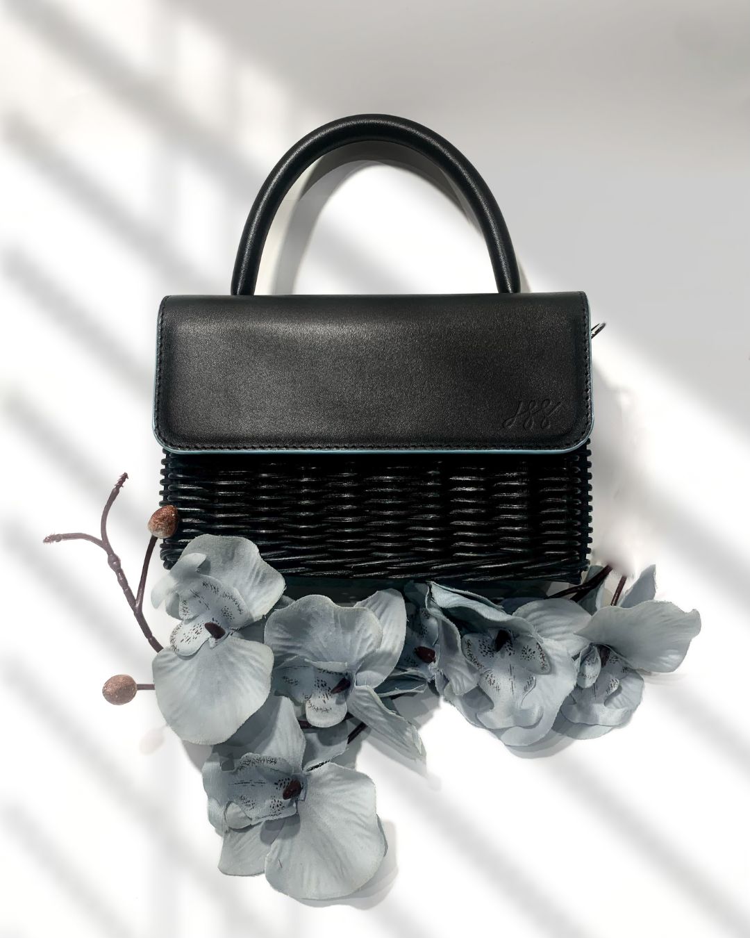 MARGIE BLACK ON BLACK BLUE