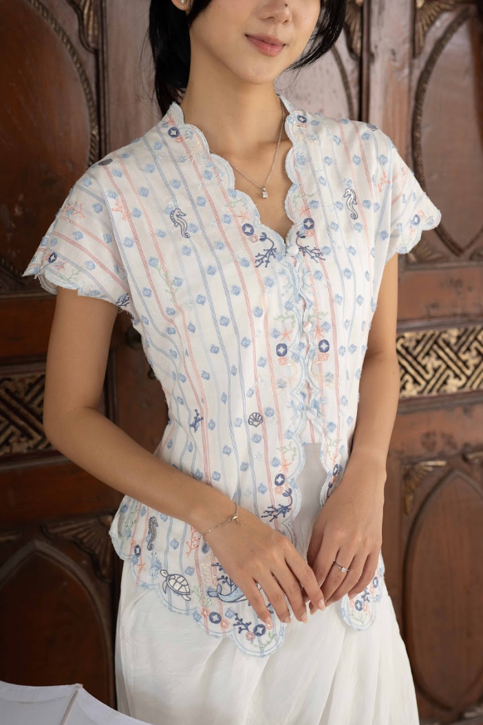 NUSA TOP